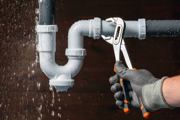 Professional Emergency Plumber technician working in Sparta, MI